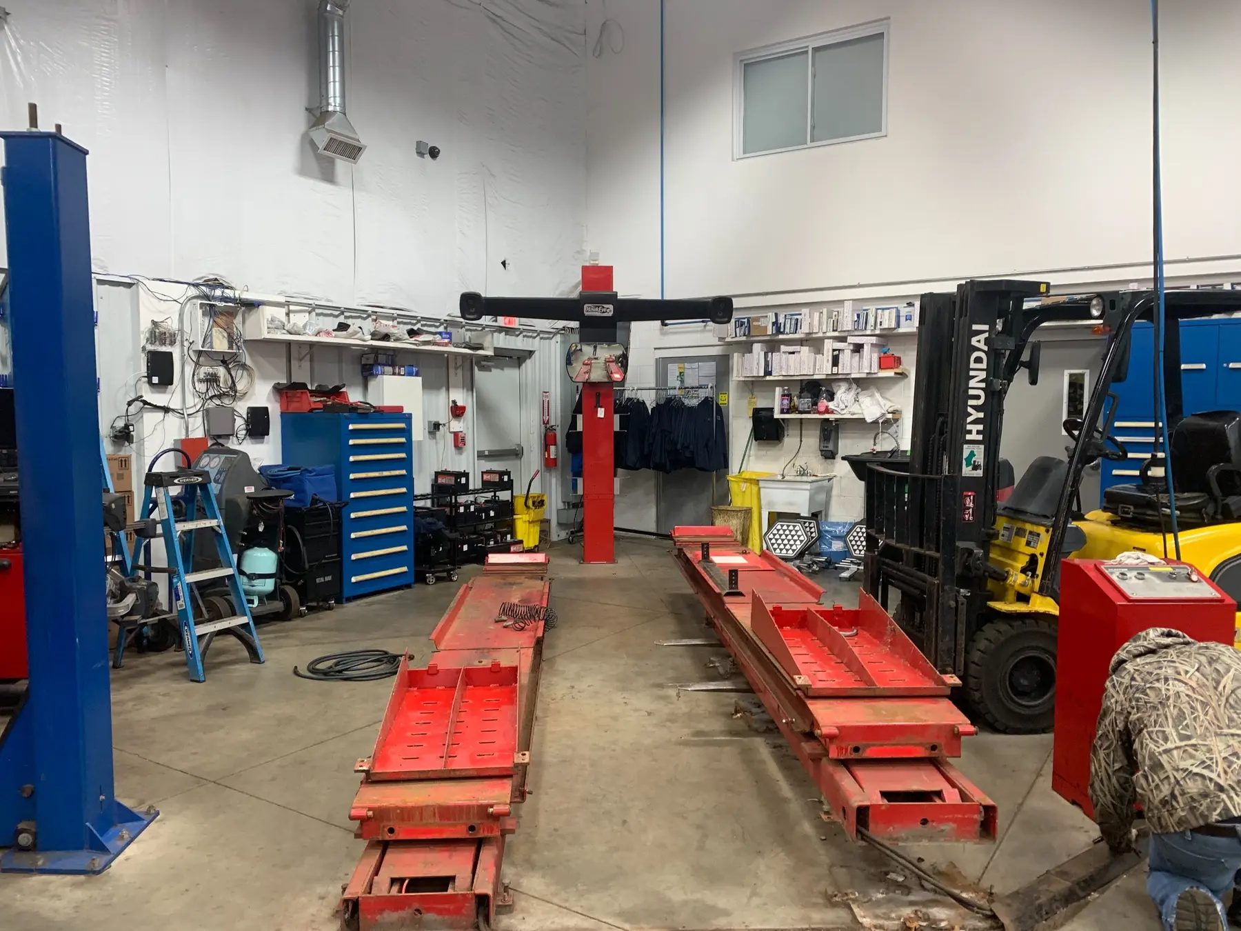 Service bay before renovation with older red rack