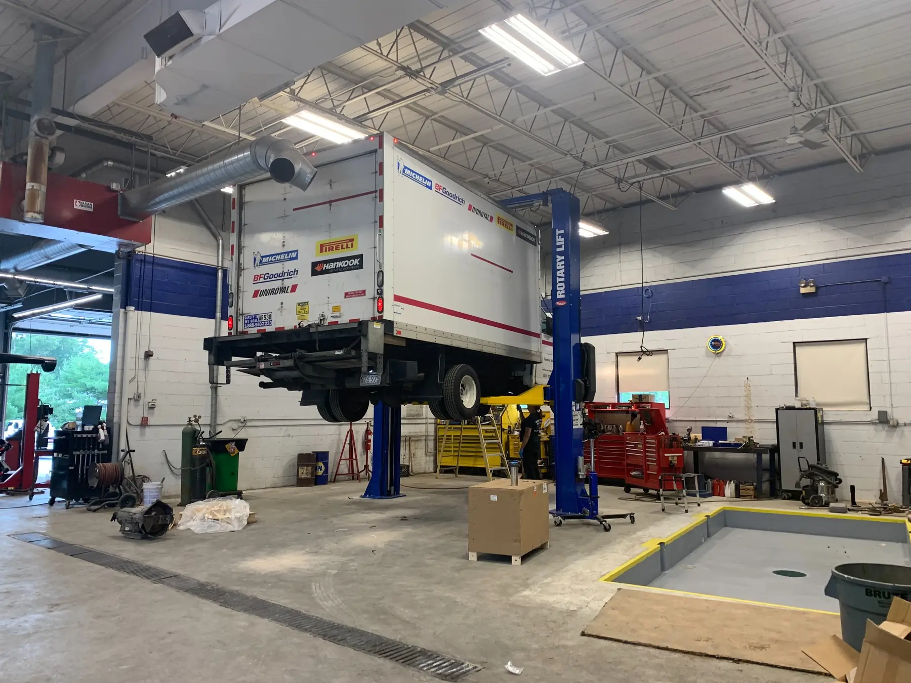 Large commercial vehicle positioned on an installed lift