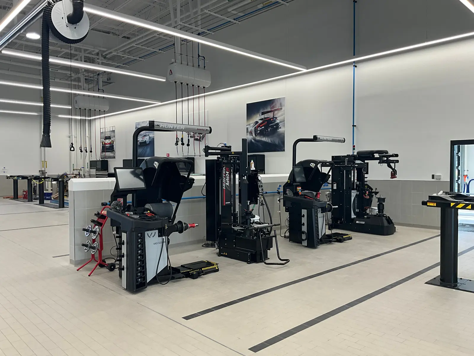 Tire and wheel-service equipment installed in a finished dealership facility